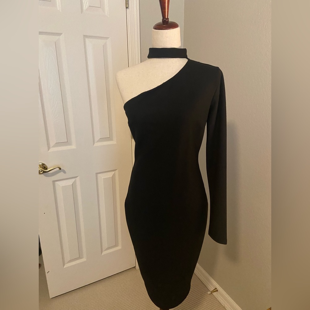 Black Evening dress I’m sz Large. A. Peach brand. Very unique